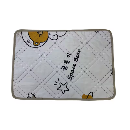Pet training potty mats with cute cartoon dog and cat designs.