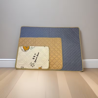 Pet training potty mats with cute cartoon dog and cat designs.