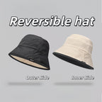 Reversible bucket hat with a narrow brim.