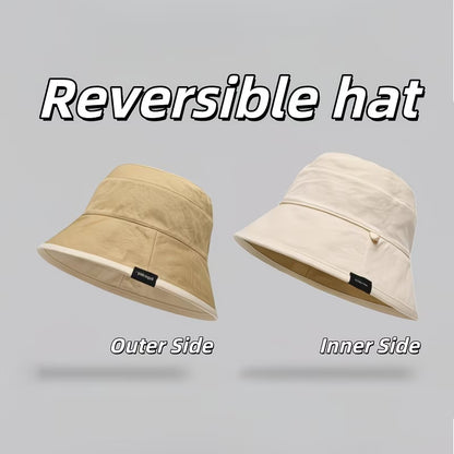 Reversible bucket hat with a narrow brim.