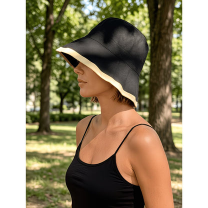 Reversible bucket hat with a narrow brim.