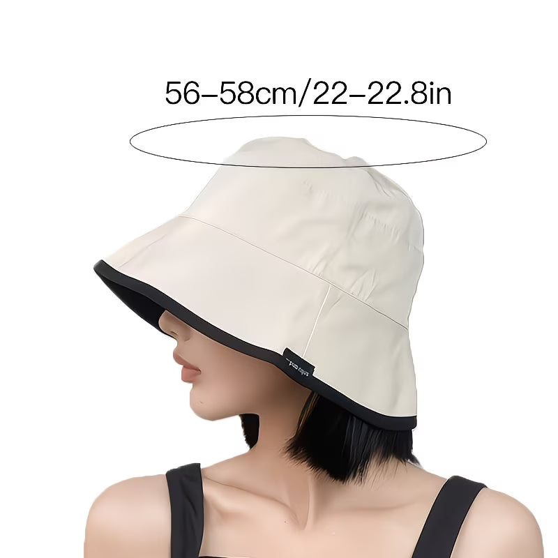 Reversible bucket hat with a narrow brim.