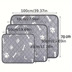Pet training potty mats with cute cartoon dog and cat designs.