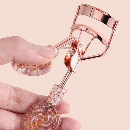 A fashionable and luxurious transparent eyelash curler with curled lashes