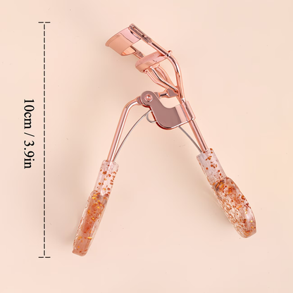 A fashionable and luxurious transparent eyelash curler with curled lashes