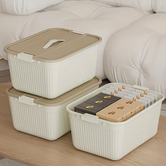 Three plastic storage boxes with lids, snaps, and handles, suitable for home organization.